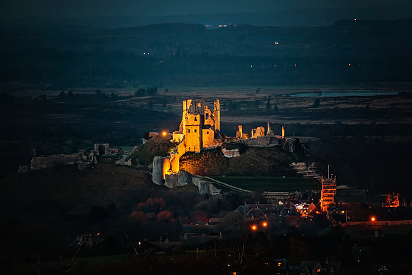 Illuminated Corfe Castle at Night
